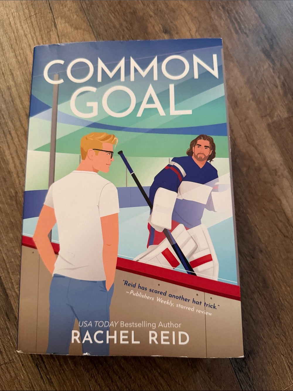 "Common Goal" Paperback Book - Blue/White Cover by Rachel Reid